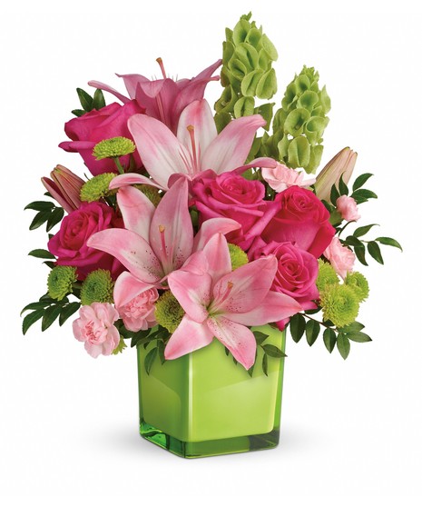 dark pink roses, pink asiatic lilies, pink miniature carnations, bells of ireland and green button spray chrysanthemums