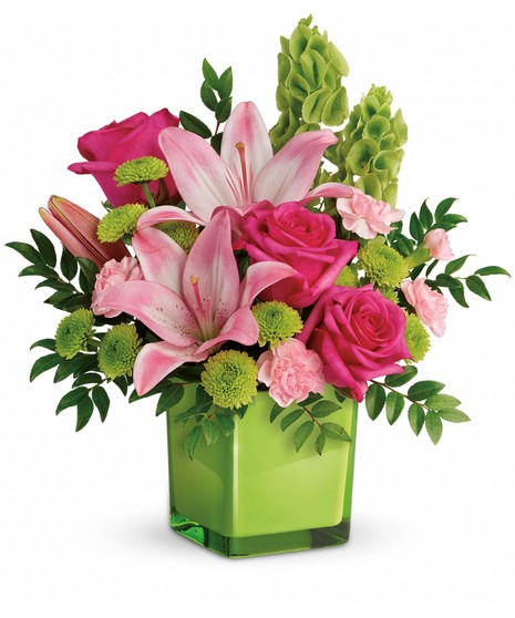 dark pink roses, pink asiatic lilies, pink miniature carnations, bells of ireland and green button spray chrysanthemums