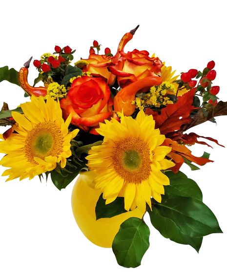 sunflowers, orange roses & hypericum designed in a yellow pitcher vase