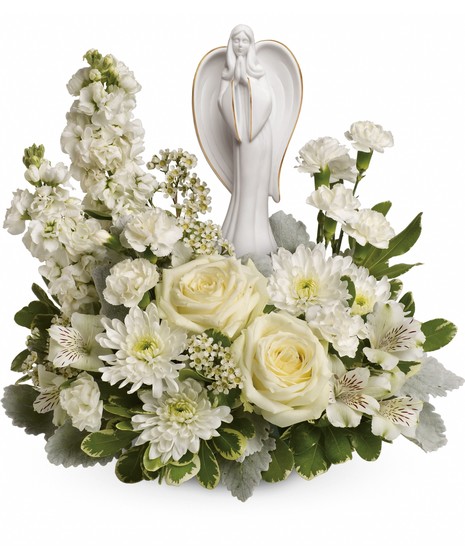 A wonderfully designed smypathy bouquet with  a graceful angel resting amongst fragrant, snow white roses, and Alstroemeria