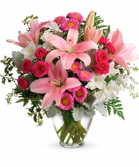 Hot pink spray roses, pink Asiatic lilies, white alstroemeria and accent flowers